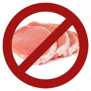 No alimentes a tu perro con carne de puerco cruda